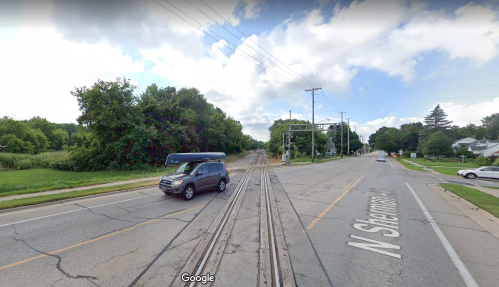 Bike crossing in Madison/Maple Bluff with near-parallel train track crossings