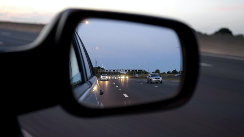 Cars in rear view mirror